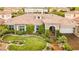 Charming single-story home with meticulously landscaped front yard and inviting gated entry at 213 Villa Borghese St, Las Vegas, NV 89138