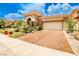Home featuring a spacious two-car garage and a stamped concrete driveway at 213 Villa Borghese St, Las Vegas, NV 89138