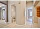 Hallway leading to a bathroom, bedroom, and other rooms in the house at 213 Villa Borghese St, Las Vegas, NV 89138