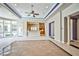Open-concept living room with backyard access and a view of the kitchen at 213 Villa Borghese St, Las Vegas, NV 89138