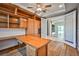 Office features custom cabinetry and hardwood floors, with a view of living room at 213 Villa Borghese St, Las Vegas, NV 89138
