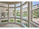 Bright sunroom featuring floor-to-ceiling windows with a view of the pool at 213 Villa Borghese St, Las Vegas, NV 89138