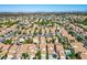 Expansive aerial view of residential community with lush landscaping at 2316 Pine Bluff Ct, Las Vegas, NV 89134