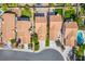 An aerial view of a neighborhood featuring well-maintained homes with tile roofs and manicured lawns at 2316 Pine Bluff Ct, Las Vegas, NV 89134