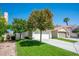 Charming home with manicured lawn and mature trees at 2316 Pine Bluff Ct, Las Vegas, NV 89134
