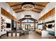 Spacious clubhouse interior with high ceilings, modern design, and inviting seating area at 2395 Arrington Ave, North Las Vegas, NV 89086
