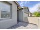 Exterior of single story home with gray brick driveway at 2395 Arrington Ave, North Las Vegas, NV 89086
