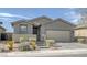Charming single story home with a well maintained xeriscaped front yard at 2395 Arrington Ave, North Las Vegas, NV 89086