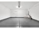 Spacious two car garage with epoxy flooring and storage at 2395 Arrington Ave, North Las Vegas, NV 89086