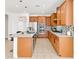 Modern kitchen featuring a large island, stainless steel appliances and granite countertops at 2395 Arrington Ave, North Las Vegas, NV 89086