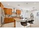 Open concept kitchen with stainless steel appliances, granite countertops, and lots of cabinet space at 2395 Arrington Ave, North Las Vegas, NV 89086