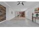 Spacious open floor plan living room connecting to the kitchen with recessed lights at 2395 Arrington Ave, North Las Vegas, NV 89086
