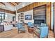 Cozy lounge area with modern furnishings, a fireplace, and stylish decor at 2395 Arrington Ave, North Las Vegas, NV 89086