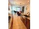 Open-concept space offering views of kitchen, dining, and living areas at 2395 Arrington Ave, North Las Vegas, NV 89086