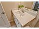 Bright bathroom featuring a vanity with white countertop, chrome faucet and decor at 2497 Birch Hollow St, Henderson, NV 89044