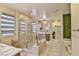 Luxurious bathroom featuring a glass shower, soaking tub, dual vanities, and modern finishes at 2497 Birch Hollow St, Henderson, NV 89044