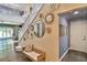 Inviting entryway featuring staircase with gallery wall at 2497 Birch Hollow St, Henderson, NV 89044