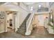 Spacious entryway with staircase and access to living area at 2497 Birch Hollow St, Henderson, NV 89044