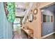 Inviting entryway with a staircase, bench, and stylish decor at 2497 Birch Hollow St, Henderson, NV 89044