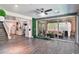 Bright living room with large windows and an outdoor patio area at 2497 Birch Hollow St, Henderson, NV 89044