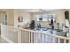 Upstairs loft offering versatile space for exercise equipment and leisure, with plenty of natural light at 2497 Birch Hollow St, Henderson, NV 89044
