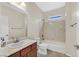 Bright bathroom features a shower-tub combo with granite-look surround at 2753 Kildrummie St, Henderson, NV 89044