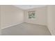 Neutral carpeted bedroom with a window offers natural light at 2753 Kildrummie St, Henderson, NV 89044