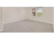 Light carpeted bedroom with a window showing outdoor views at 2753 Kildrummie St, Henderson, NV 89044