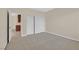 Carpeted bedroom with closet and access to hall storage at 2753 Kildrummie St, Henderson, NV 89044