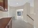 Upstairs hallway with views of backyard, and neutral carpet at 2753 Kildrummie St, Henderson, NV 89044