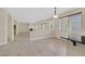 Bright living room with tile floors, fireplace, and access to outdoor space at 2753 Kildrummie St, Henderson, NV 89044