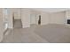 Open floor plan with tile flooring and staircase leading to the upper level at 2753 Kildrummie St, Henderson, NV 89044
