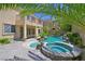 Outdoor living with a private pool, waterfall feature, spa, and spacious patio area at 2753 Kildrummie St, Henderson, NV 89044