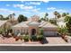 Charming single-story home with a well-manicured front yard, driveway, and two-car garage at 277 Dark Forest Ave, Las Vegas, NV 89123