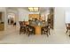 Open kitchen featuring bar seating, custom cabinets, and stainless appliances at 277 Dark Forest Ave, Las Vegas, NV 89123