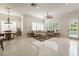 Open living space with access to the pool, showcasing tile floors, shutters, and a seating area at 277 Dark Forest Ave, Las Vegas, NV 89123