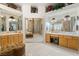 Luxurious bathroom boasting marble floors, and sinks, and elegant decor at 277 Dark Forest Ave, Las Vegas, NV 89123