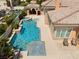 Aerial view of a modern pool and spa design featuring multiple water features and seating areas at 277 Dark Forest Ave, Las Vegas, NV 89123