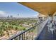 Balcony view overlooking a golf course and the Las Vegas skyline at 3111 Bel Air Dr # 27E, Las Vegas, NV 89109