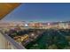Wonderful nighttime view of the Las Vegas skyline and surrounding neighborhood at 3111 Bel Air Dr # 27E, Las Vegas, NV 89109
