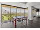 Dining area with city views through large windows, providing abundant natural light at 3111 Bel Air Dr # 27E, Las Vegas, NV 89109