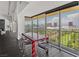 Stylish dining area with full-length windows offering panoramic views of the cityscape at 3111 Bel Air Dr # 27E, Las Vegas, NV 89109