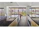 Spacious kitchen with stainless steel appliances, marble countertops, light cabinetry, and cityscape views at 3111 Bel Air Dr # 27E, Las Vegas, NV 89109