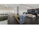 Open-concept living space with marble island, stainless steel appliances, modern lighting and comfortable seating at 3111 Bel Air Dr # 27E, Las Vegas, NV 89109