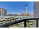 Balcony view features the Sahara hotel and the Stratosphere tower, complemented by lush greenery at 322 Karen Ave # 601, Las Vegas, NV 89109