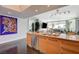 Gourmet kitchen open to living area, showcasing granite countertops and stainless appliances at 322 Karen Ave # 601, Las Vegas, NV 89109