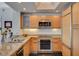 Contemporary kitchen with stainless steel appliances, granite countertops, and ample storage at 322 Karen Ave # 601, Las Vegas, NV 89109