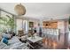 Inviting living area with access to a balcony, hardwood floors, and an open layout at 322 Karen Ave # 601, Las Vegas, NV 89109