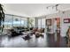 Bright, open living room with floor-to-ceiling windows and comfortable seating at 322 Karen Ave # 601, Las Vegas, NV 89109