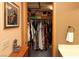 Walk-in closet with organized shelving and hanging storage, showcasing ample space at 3236 Manzanita Ln, Laughlin, NV 89029